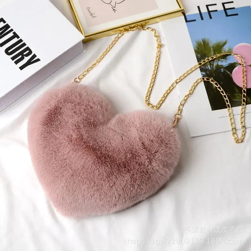 Heart Shaped Faux Fur Crossbody Wallet Crafted from high-quality faux fur, this wallet is soft to the touch and luxurious to look at. My Store