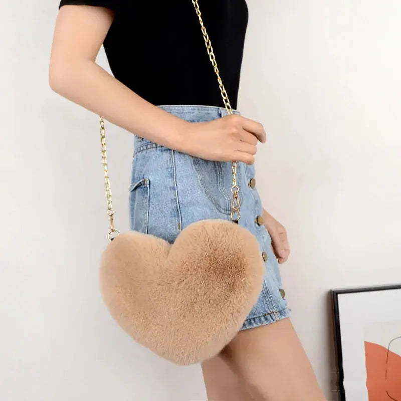 Heart Shaped Faux Fur Crossbody Wallet Crafted from high-quality faux fur, this wallet is soft to the touch and luxurious to look at. My Store