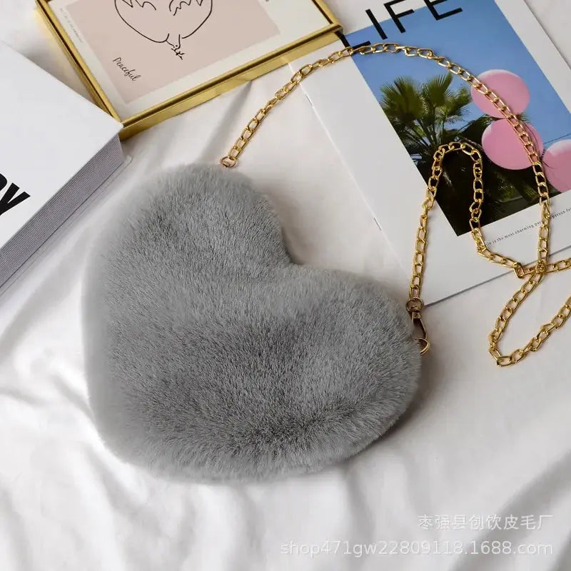 Heart Shaped Faux Fur Crossbody Wallet Crafted from high-quality faux fur, this wallet is soft to the touch and luxurious to look at. My Store