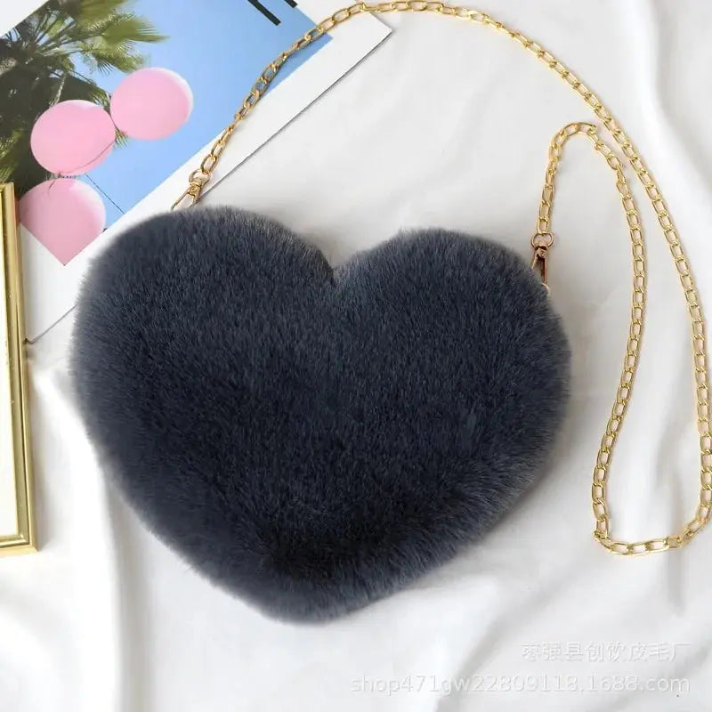 Heart Shaped Faux Fur Crossbody Wallet Crafted from high-quality faux fur, this wallet is soft to the touch and luxurious to look at. My Store