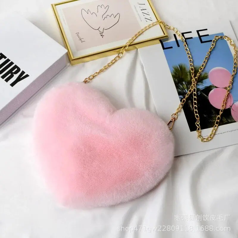 Heart Shaped Faux Fur Crossbody Wallet Crafted from high-quality faux fur, this wallet is soft to the touch and luxurious to look at. My Store
