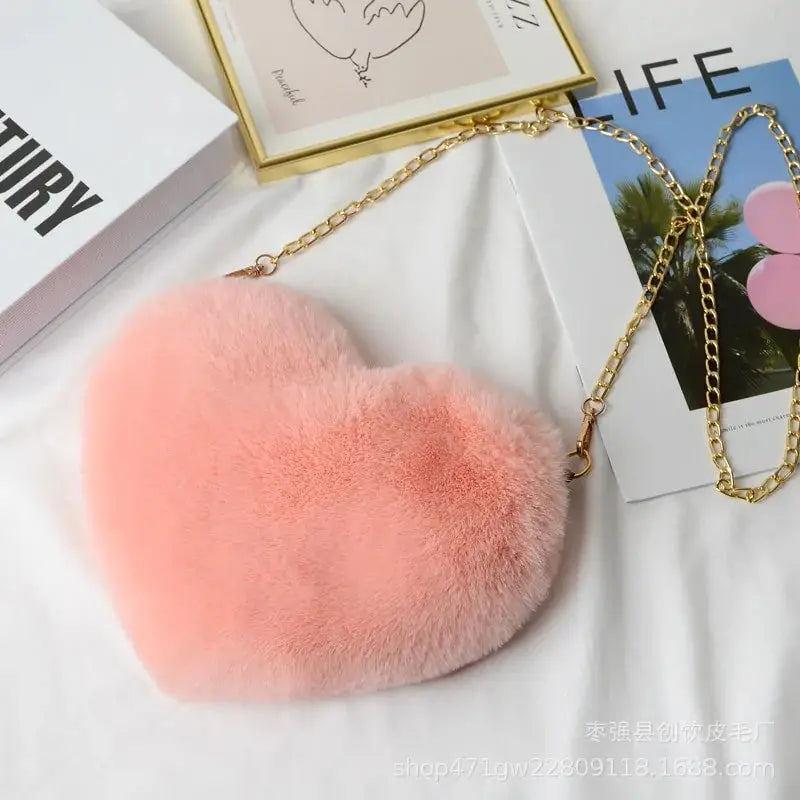 Heart Shaped Faux Fur Crossbody Wallet Crafted from high-quality faux fur, this wallet is soft to the touch and luxurious to look at. My Store
