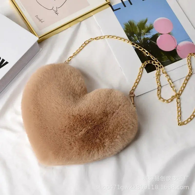 Heart Shaped Faux Fur Crossbody Wallet Crafted from high-quality faux fur, this wallet is soft to the touch and luxurious to look at. My Store