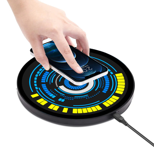 Hand placing a smartphone on a wireless charging pad with a futuristic design.