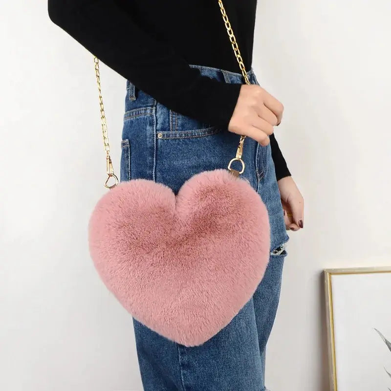 Heart Shaped Faux Fur Crossbody Wallet Crafted from high-quality faux fur, this wallet is soft to the touch and luxurious to look at. My Store